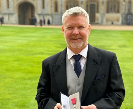 OM Neil Greenwood 74 81 MBE photo with medal